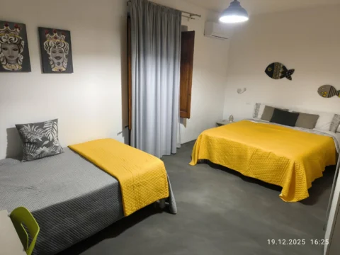 Camera tripla, Foto 1